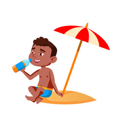 Boy Kid Sitting On Beach Under Umbrella