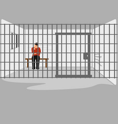 Man Sitting Stressed In A Prison Cell