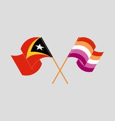 Crossed And Waving Flags Of East Timor And