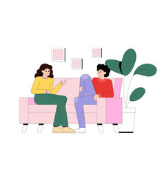 Young Man And Female Sitting On Sofa And Talking