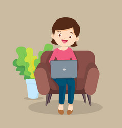 Woman Using Laptop On Sofa