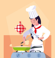 Professional Chef Female In Kitchen Cooking