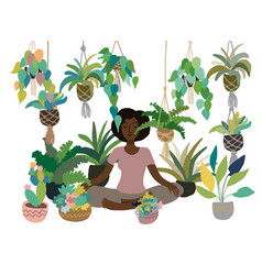 Woman Sitting Surrounded By Home Plants