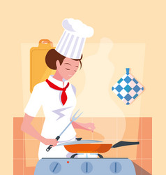 Professional Chef Female In Kitchen Cooking