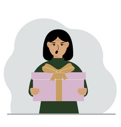 Screaming Woman Holds A Large Gift Box With A Bow