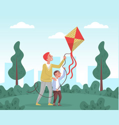 Father And Son Playing Kite In Park Parents