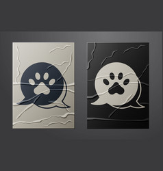 White Paw Print Icon Isolated On Crumpled Paper