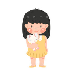 Cute Child Girl Holding A Rabbit Doll