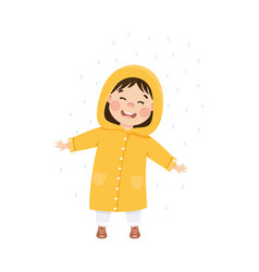 Happy Girl In Yellow Raincoat Walking And Having