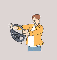 Smiling Man With Steering Wheel In Hands