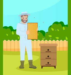 Beekeeper Wearing Protection Suit Hold