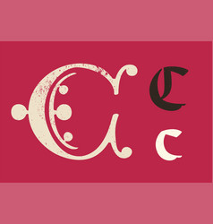 C Letter Drop Cap Logo Illuminated Initial