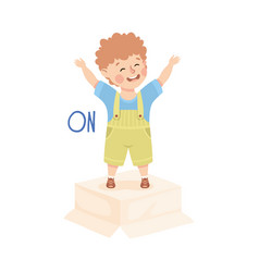 Little Boy Standing On Cardboard Box With Raised