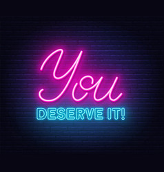 You Deserve It Neon Quote On A Brick Wall