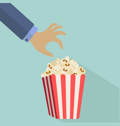 Hand Reaching For Popcorn