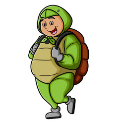 Young Man With A Turtle Costume Is Walking Around