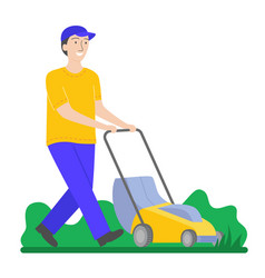 Man Mows The Grass With A Yellow Lawn Mower