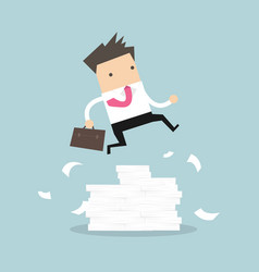 Businessman Jumping Over Large Stack Of Documents