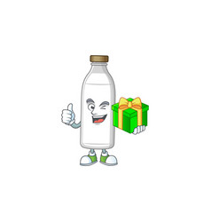 Smiley Milk Bottle Character Holding A Gift Box