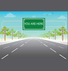 Road Sign With You Are Here Words On Highway