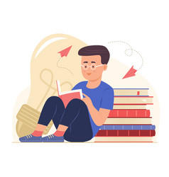 Cute Student Boy Sitting And Reading A Book