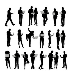 Silhouettes Of Business People Working At Laptop