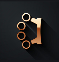 Gold Brass Knuckles Icon Isolated On Black