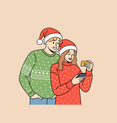 Couple In Christmas Clothes Makes Purchases