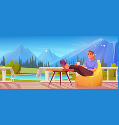 Man Sitting On Porch With Mountain View Background