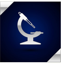 Silver Microscope Icon Isolated On Dark Blue