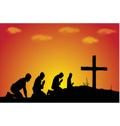 Silhouette Of People Praying At Sunset With Cross