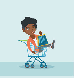 Young African Woman Riding In Shopping Cart