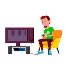 Boy Playing Video Games On Console In Living Room