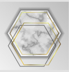 Gold Hexagonal Frame On A White Marble Slab