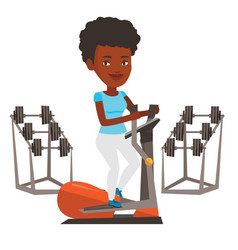 Woman Exercising On Elliptical Trainer