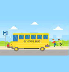 School Boys Running To Yellow Bus At Bus