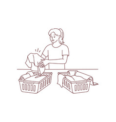 Woman Sorting Laundry In Baskets