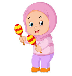 A Cute Muslim Girl Playing Maracas Musical