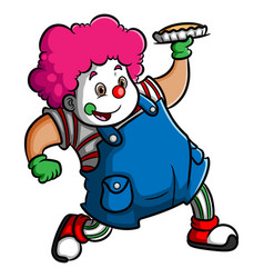 Young Clown Boy Is Serving The Plate Of Pie