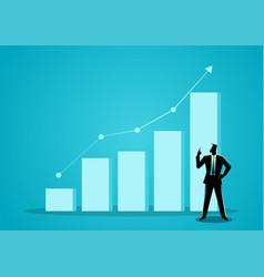 Businessman Pointing Up With Increasing Graph