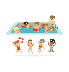 Small Children Having Fun In Water Of The Pool