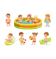 Small Children Having Fun In Water Of The Pool