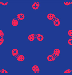 Red Gamepad Icon Isolated Seamless Pattern On Blue