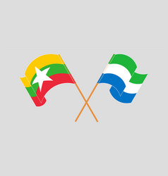 Crossed And Waving Flags Of Myanmar And Sierra