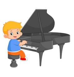 A Cute Boy Is Learning To Play The Piano