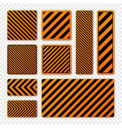 Various Black And Orange Warning Signs With