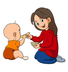 Mother Is Feeding Her Child While Sitting