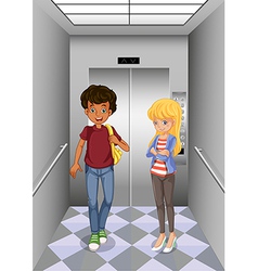 Two Teenagers At The Elevator