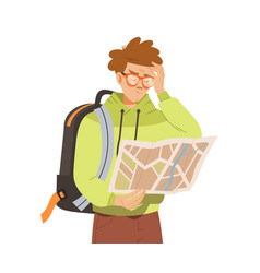 Male In Hoody With Backpack Examining Map