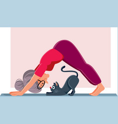 Senior Lady Exercising On A Yoga Mat With Her Cat